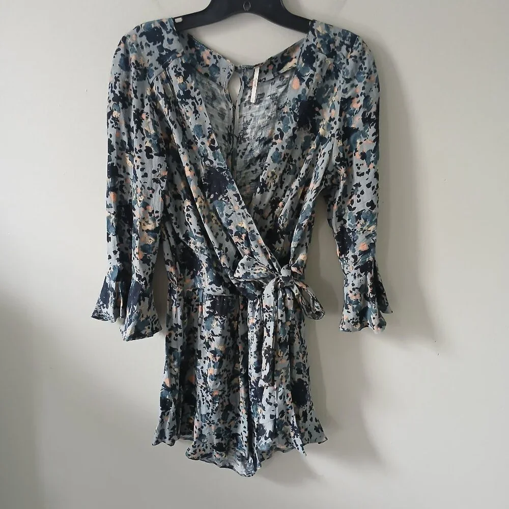 Free People Size S All the Right Ruffles Blue Floral Romper Flutter Sleeve Vneck